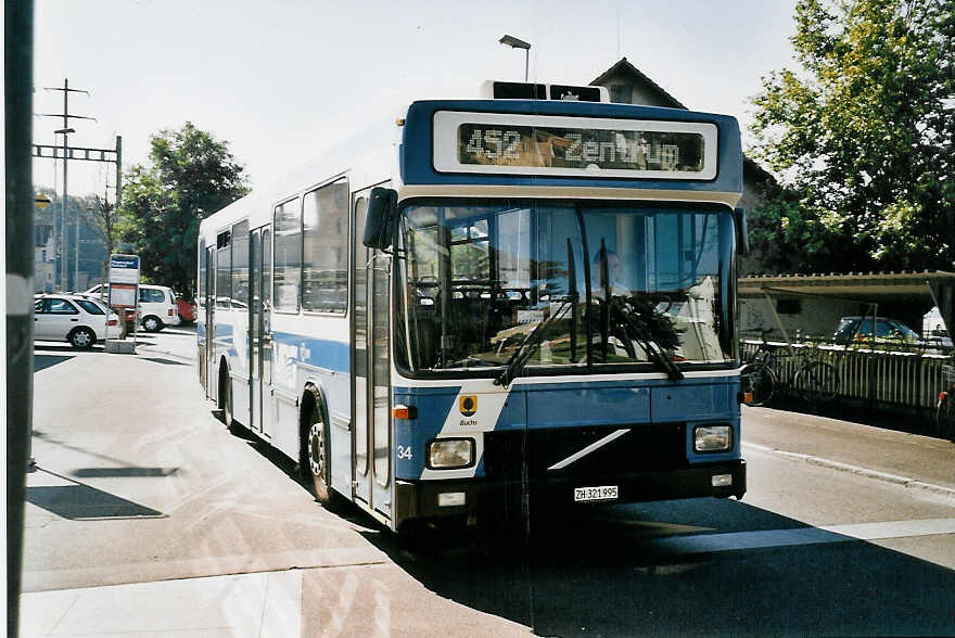 (061'621) - VBRF Regensdorf - Nr. 34/ZH 321'995 - Volvo/Hess am 19. Juli 2003 beim Bahnhof Regensdorf