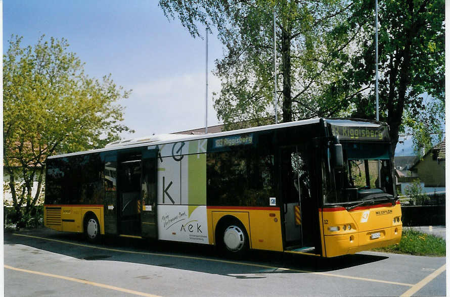 (067'601) - Engeloch, Riggisberg - Nr. 12/BE 520'404 - Neoplan (ex Nr. 4) am 16. Mai 2004 in Riggisberg, Garage