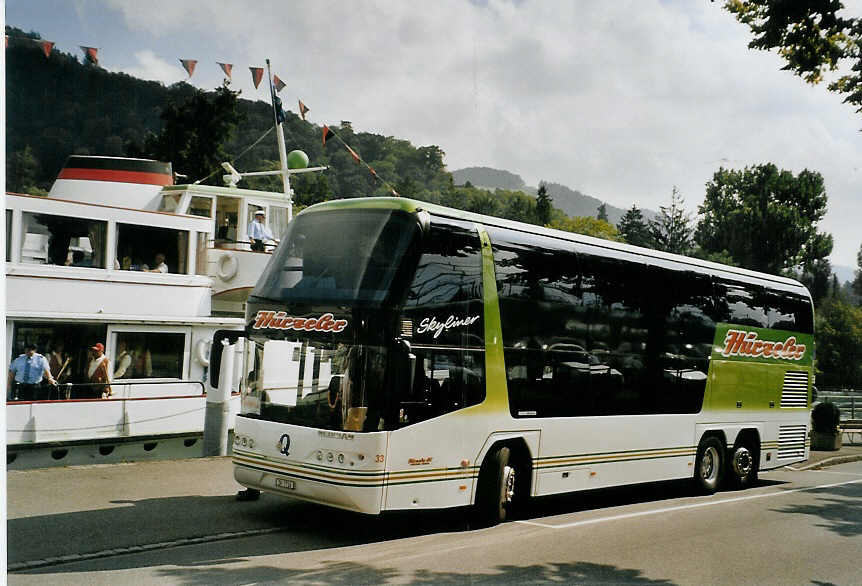 (080'411) - Hrzeler, Dietikon - Nr. 33/ZH 7716 - Neoplan am 14. September 2005 bei der Schifflndte Thun