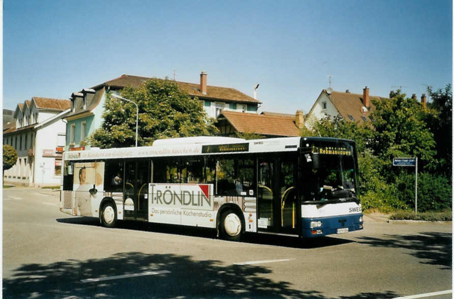 (097'031) - SWEG Lahr - FR-H 9384 - MAN am 6. August 2007 beim Bahnhof Lrrach