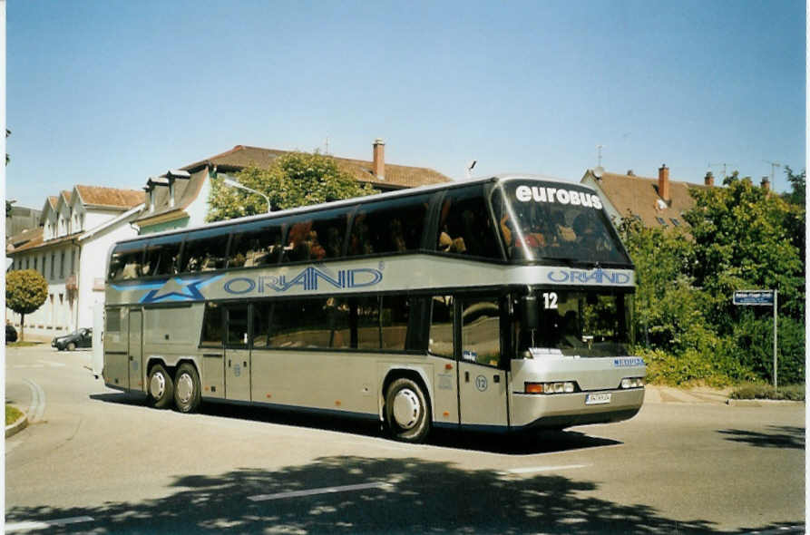 (097'033) - Orland, Schweinfurt - Nr. 12/SW-KH 24 - Neoplan am 6. August 2007 beim Bahnhof Lrrach