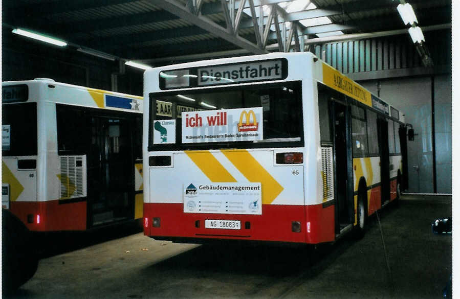 (100'932) - RVBW Wettingen - Nr. 65/AG 18'083 - MAN am 3. November 2007 in Wettingen, Garage