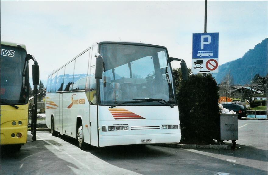 (106'033) - Schmid, Neuenkirch - OW 23'926 - Drgmller am 30. Mrz 2008 beim Bahnhof Interlaken West