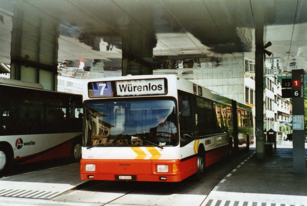 (117'411) - RVBW Wettingen - Nr. 129/AG 60'318 - MAN am 8. Juni 2009 beim Bahnhof Baden