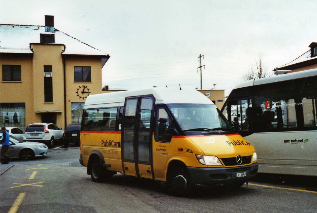 (124'430) - CarPostal Ouest - JU 36'947 - Mercedes/VDL-Kusters am 15. Februar 2010 beim Bahnhof Delmont