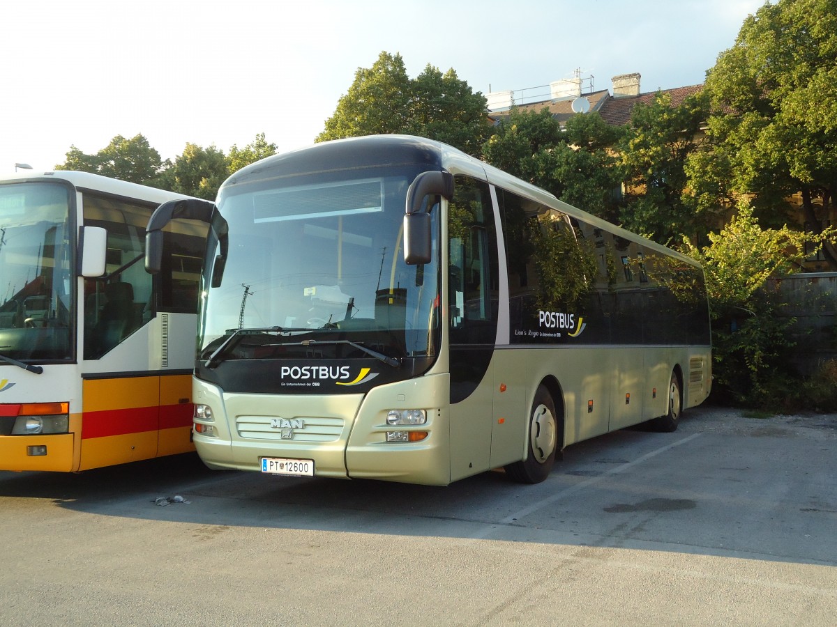 (128'462) - PostBus - PT 12'600 - MAN am 9. August 2010 in Wien, Garage Htteldorf