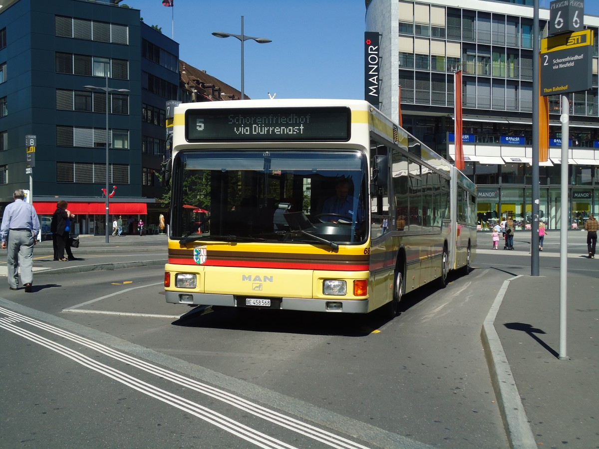 (129'221) - STI Thun - Nr. 68/BE 458'568 - MAN am 3. September 2010 beim Bahnhof Thun