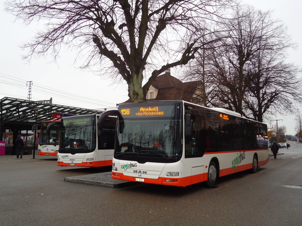 (132'326) - Regiobus, Gossau - Nr. 24/SG 88'221 - MAN am 12. Januar 2011 beim Bahnhof Gossau