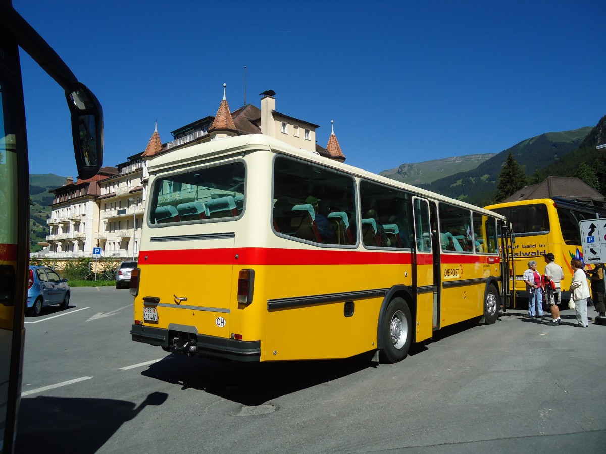 (134'681) - AVG Meiringen - Nr. 74/BE 607'481 - Saurer/R&J (ex P 24'357) am 3. Juli 2011 beim Bahnhof Grindelwald