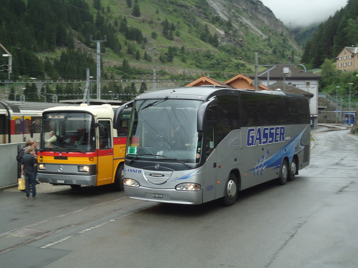 (140'374) - Gasser, Altdorf - UR 9290 - Scania/Irizar am 1. Juli 2012 beim Bahnhof Gschenen