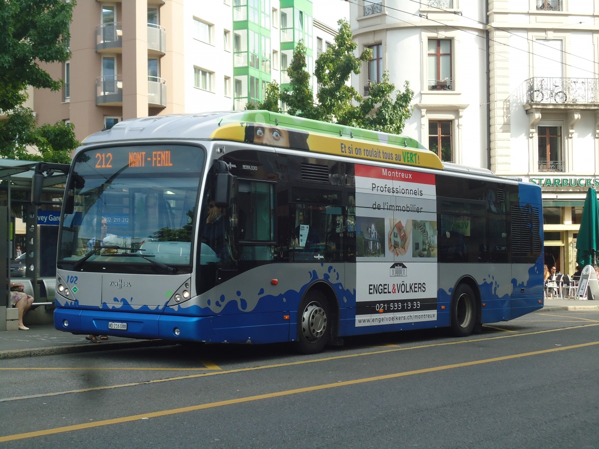 (141'841) - VMCV Clarens - Nr. 102/VD 216'088 - Van Hool am 23. September 2012 beim Bahnhof Vevey