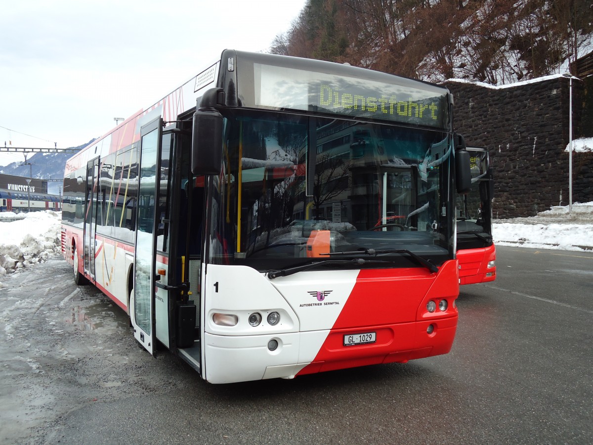 (142'578) - AS Engi - Nr. 11/GL 1029 - Neoplan (ex Nr. 1; ex SBC Chur Nr. 107) am 23. Dezember 2012 beim Bahnhof Schwanden