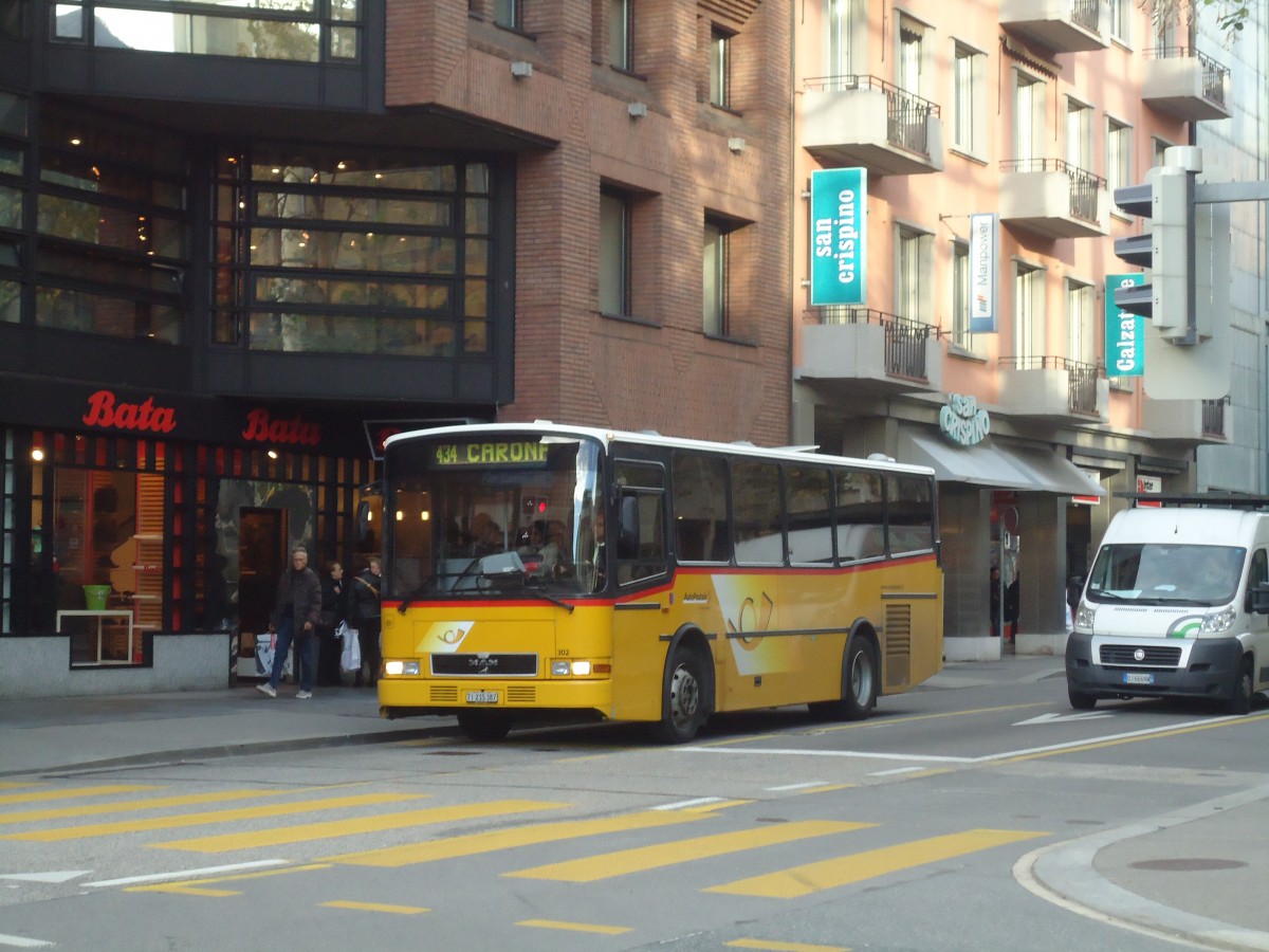 (147'707) - AutoPostale Ticino - Nr. 302/TI 215'387 - MAN/Lauber (ex P 23'023) am 5. November 2013 in Lugano, Centro