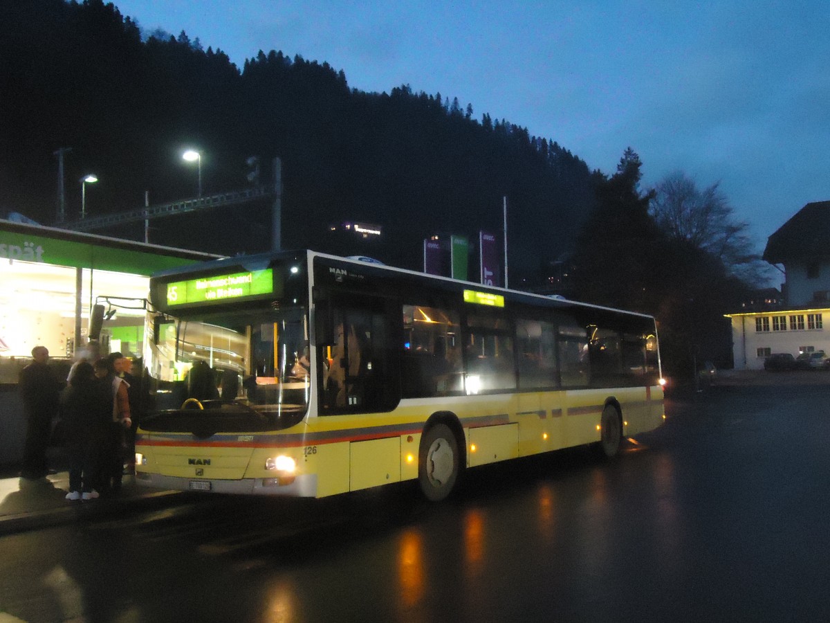 (148'310) - STI Thun - Nr. 126/BE 700'126 - MAN am 14. Dezember 2013 beim Bahnhof Oberdiessbach