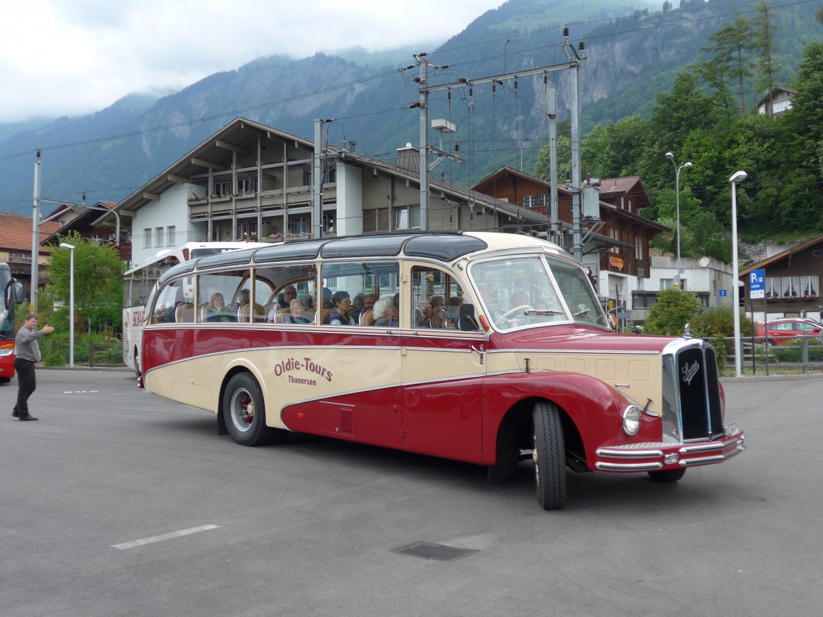 (151'555) - Reusser, Thun - BE 8484 - Saurer/R&J (ex Hsler, Menziken) am 15. Juni 2014 beim Bahnhof Brienz