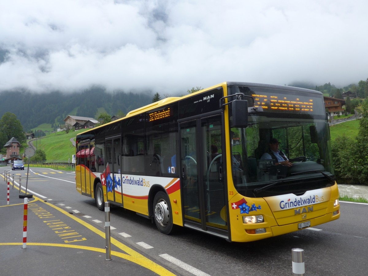 (153'558) - AVG Grindelwald - Nr. 23/BE 70'397 - MAN am 3. August 2014 beim Bahnhof Grindelwald Grund