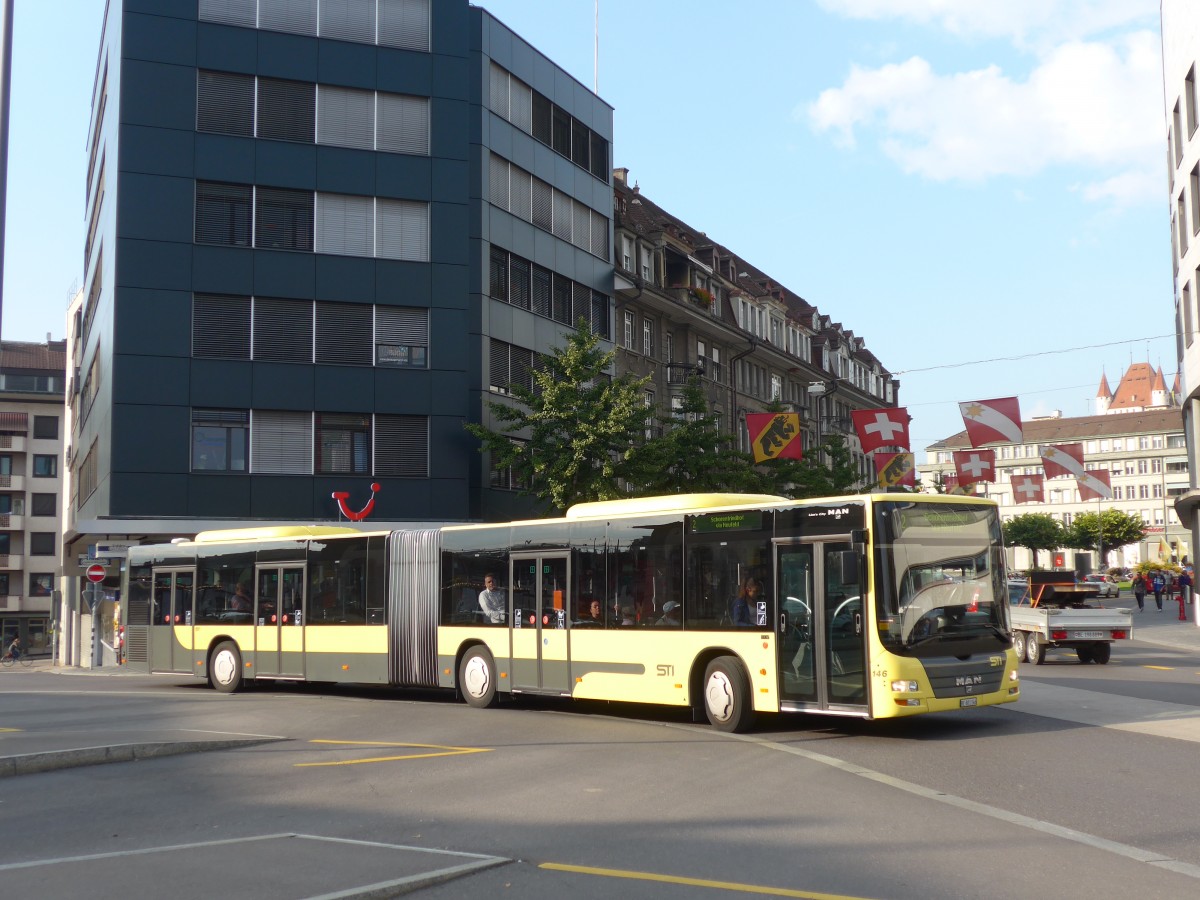 (155'449) - STI Thun - Nr. 146/BE 801'146 - MAN am 4. Oktober 2014 beim Bahnhof Thun