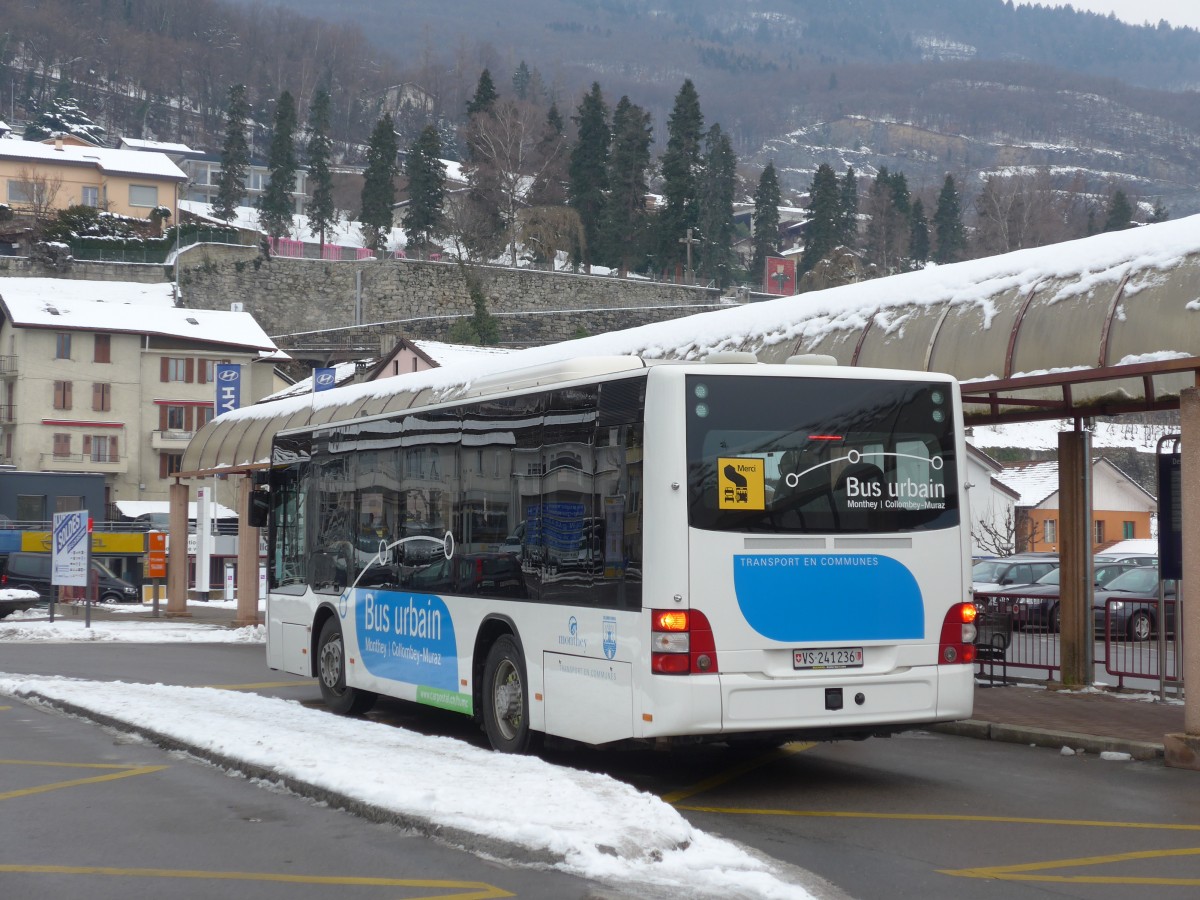 (158'145) - TPC Aigle - VS 241'236 - MAN/Gppel (ex Evasion, St-Maurice; ex Richard, Mex) am 2. Januar 2015 beim Bahnhof Monthey-Ville