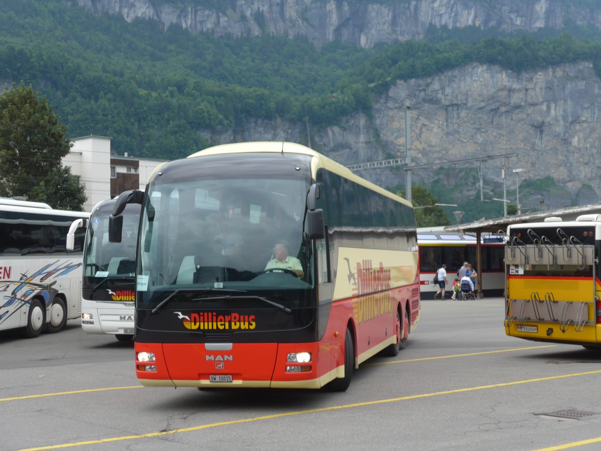 (161'987) - Dillier, Sarnen - Nr. 18/OW 10'015 - MAN am 8. Juni 2015 beim Bahnhof Meiringen