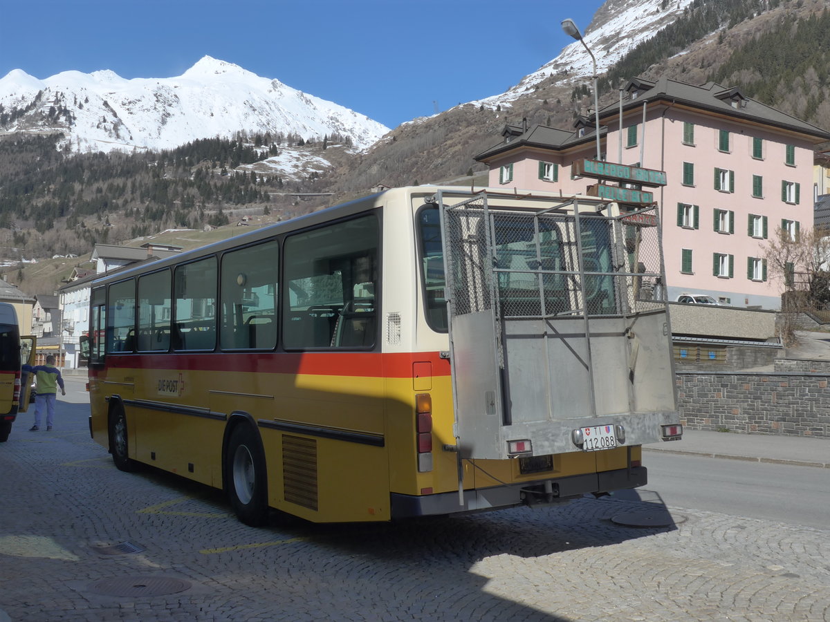 (202'523) - Marchetti, Airolo - TI 112'088 - NAW/Hess (ex PostAuto Bern; ex AVG Meiringen Nr. 66; ex P 24'452) am 19. Mrz 2019 beim Bahnhof Airolo