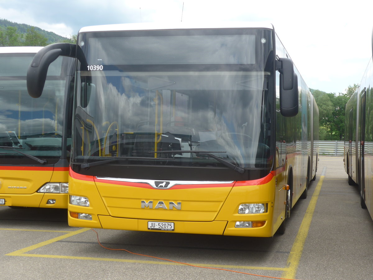 (216'943) - CarPostal Ouest - JU 52'075 - MAN (ex Nr. 35) am 10. Mai 2020 in Develier, Parkplatz