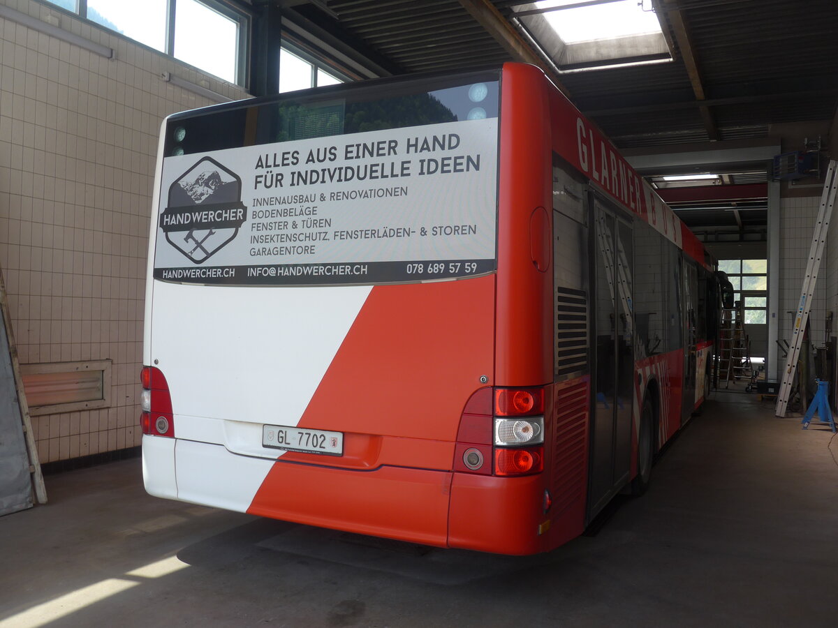 (226'473) - AS Engi - Nr. 2/GL 7702 - MAN (ex WilMobil, Wil Nr. 255; ex Vorfhrfahrzeug) am 12. Juli 2021 in Engi, Garage