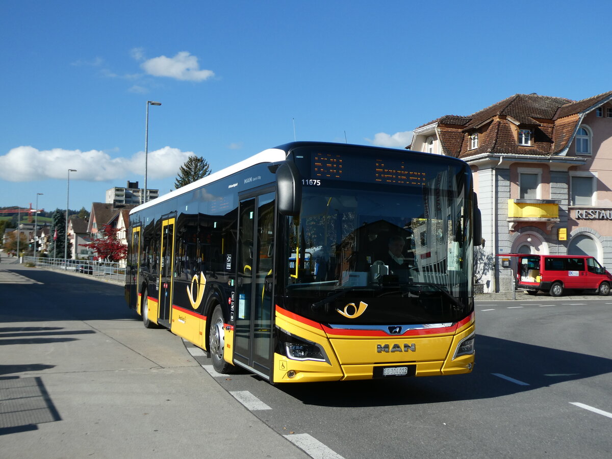 (229'764) - PostAuto Ostschweiz - SG 304'012 - MAN am 23. Oktober 2021 beim Bahnhof Uznach