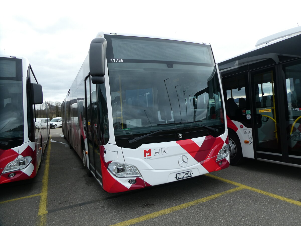 (232'636) - CarPostal Ouest - JU 35'911 - Mercedes am 6. Februar 2022 in Develier, Parkplatz