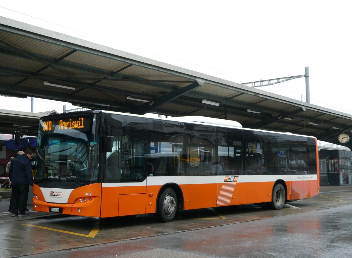 (243'290) - AOT Amriswil - Nr. 402/TG 231'399 - Neoplan (ex Nr. 6) am 29. November 2022 beim Bahnhof Romanshorn