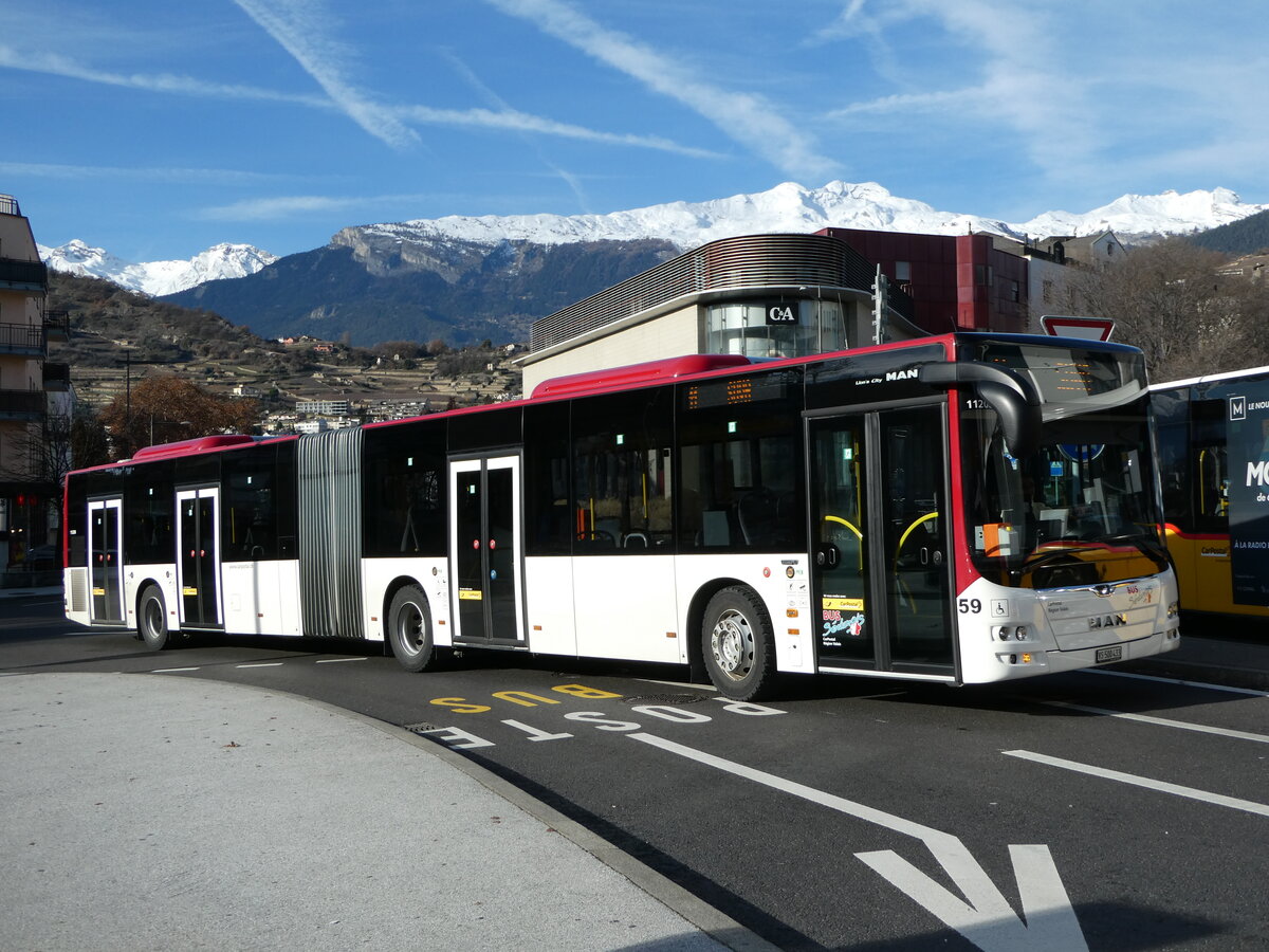 (244'257) - PostAuto Wallis - Nr. 59/VS 500'433 - MAN am 28. Dezember 2022 beim Bahnhof Sion