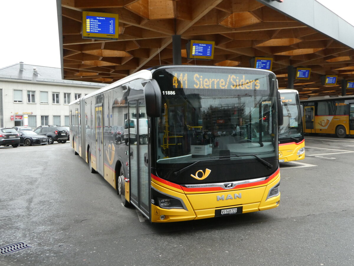 (244'991) - PostAuto Wallis - Nr. 83/VS 548'723/PID 11'886 - MAN am 11. Januar 2023 beim Bahnhof Sion