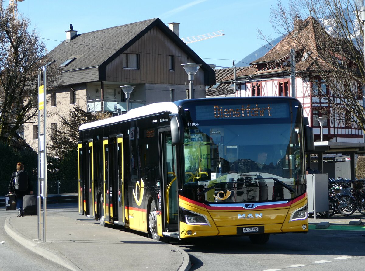 (246'162) - PostAuto Zentralschweiz - Nr. 511/NW 25'296/PID 11'904 - MAN am 16. Februar 2023 beim Bahnhof Stans