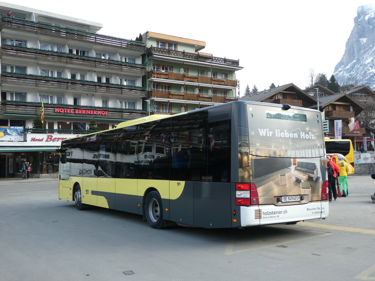 (246'209) - STI Thun - Nr. 401/BE 849'401 - MAN am 17. Februar 2023 beim Bahnhof Grindelwald (Einsatz Grindelwaldbus)