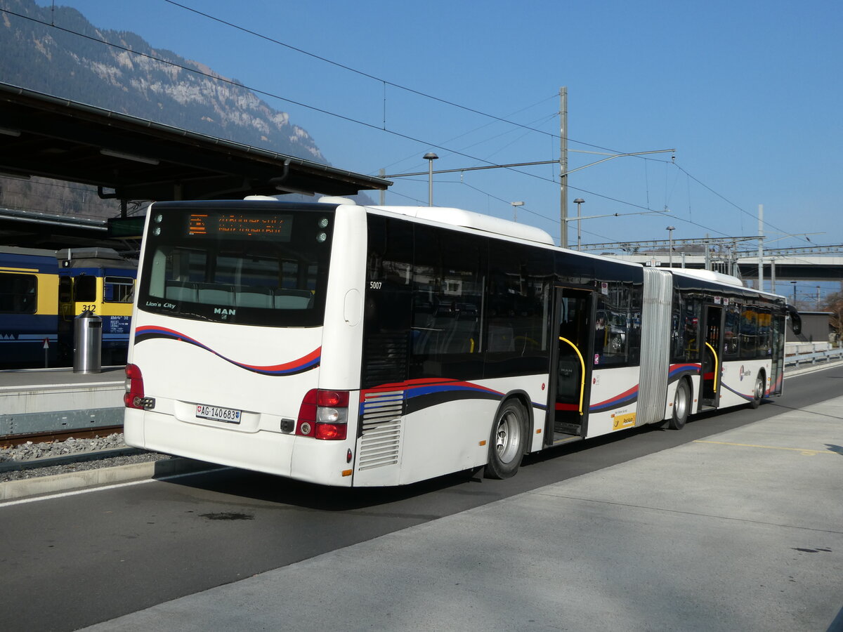 (246'803) - PostAuto Nordschweiz - AG 140'683/PID 5007 - MAN (ex Steffen, Remetschwil Nr. 58) am 2. Mrz 2023 beim Bahnhof Interlaken Ost