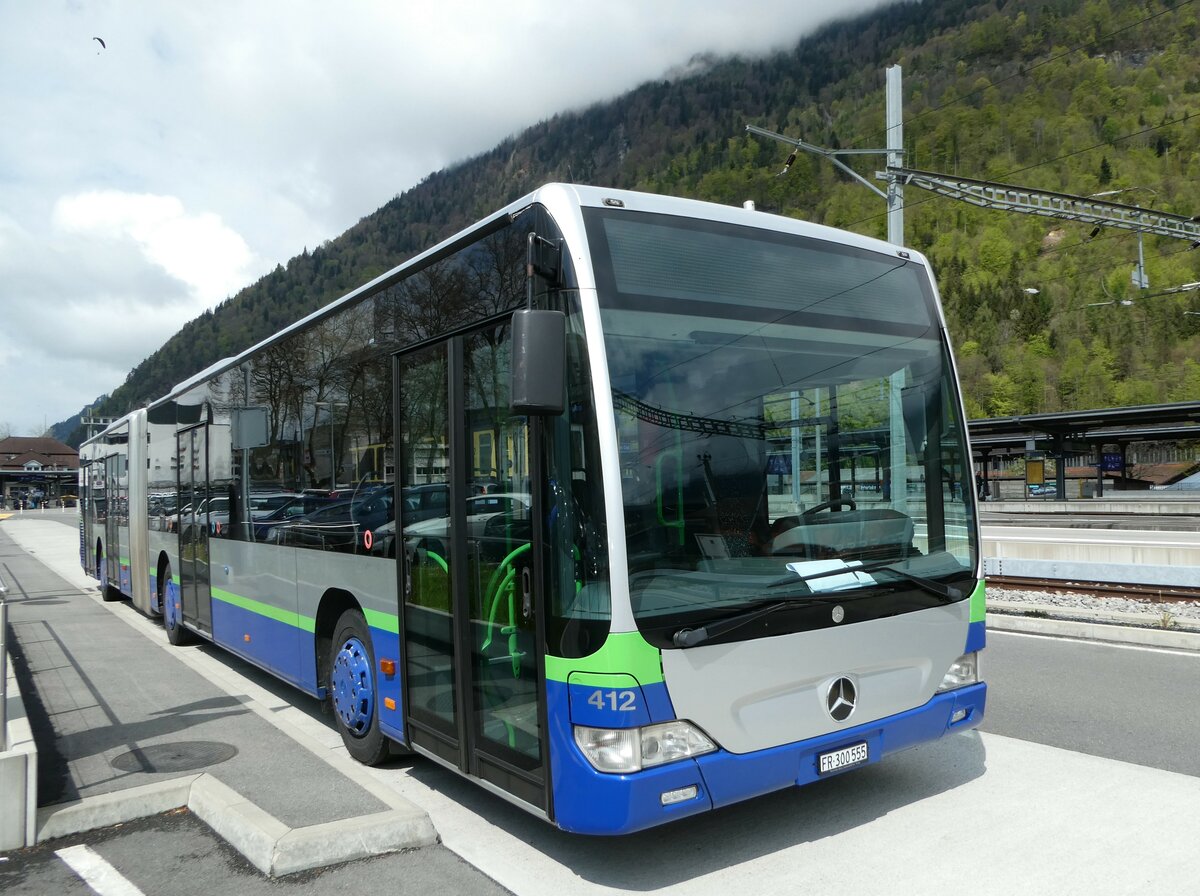 (249'384) - Intertours, Domdidier - Nr. 412/FR 300'555 - Mercedes (ex TPL Lugano Nr. 412) am 2. Mai 2023 beim Bahnhof Interlaken Ost