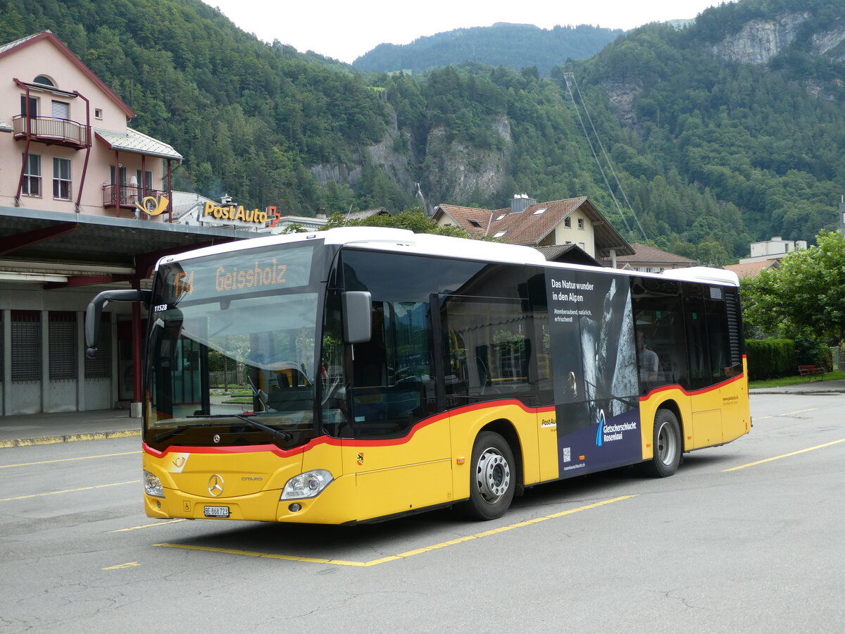 (253'118) - Flck, Brienz - Nr. 23/BE 868'723/PID 11'528 - Mercedes am 29. Juli 2023 in Meiringen, Postautostation