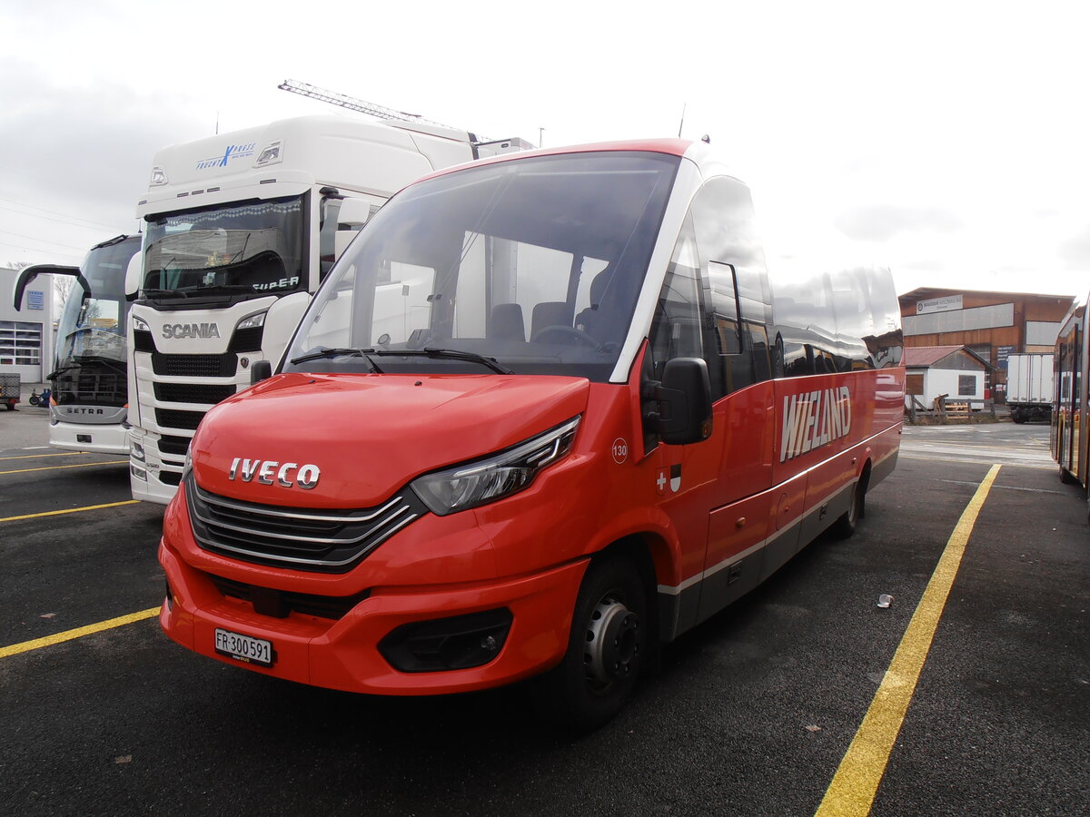 (258'077) - Wieland, Murten - Nr. 130/FR 300'591 - Iveco/Rosero am 1. Januar 2024 in Kerzers, Interbus