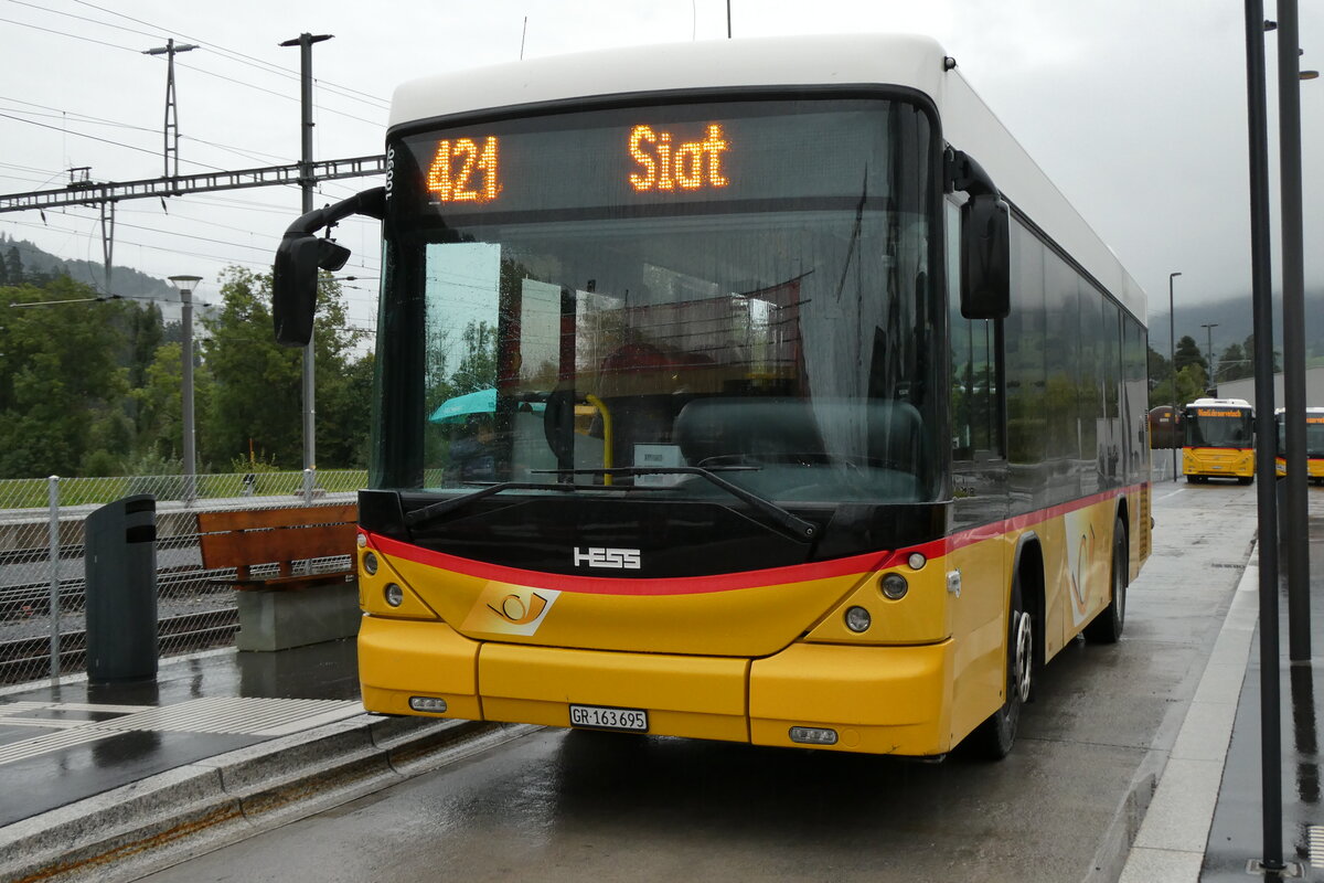 (280'214) - PostAuto Graubnden - GR 163'695/PID 10'090 - Scania/Hess (ex Nr. 54; ex Buchli, Versam) am 10. September 2025 beim Bahnhof Ilanz
