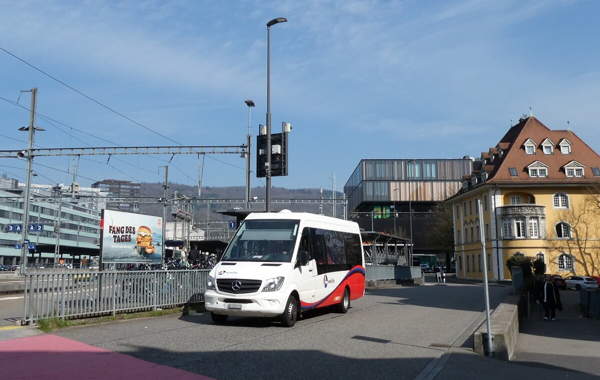 (285'504) - RVBW Wettingen - Nr. 20/AG 226'219 - Mercedes am 19. M�rz 2026 beim Bahnhof Baden