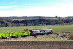 BELog 159 275 mit GATX Eamnos-Wagen Richtung Naumburg (S), am 26.02.2026 auf der Unstrutbahn bei Kleinjena.