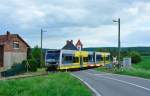 2014/343137/burgenlandbahn-907--672-901-als Burgenlandbahn 907 + 672 901 als RB 34883 von Wangen nach Naumburg Ost, am 03.05.2014 in Laucha. (Foto: Nico Martin)