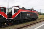 EBS 143 124-6 in einem Lokzug nach Karsdorf, am 16.06.2023 in Naumburg (S) Hbf.